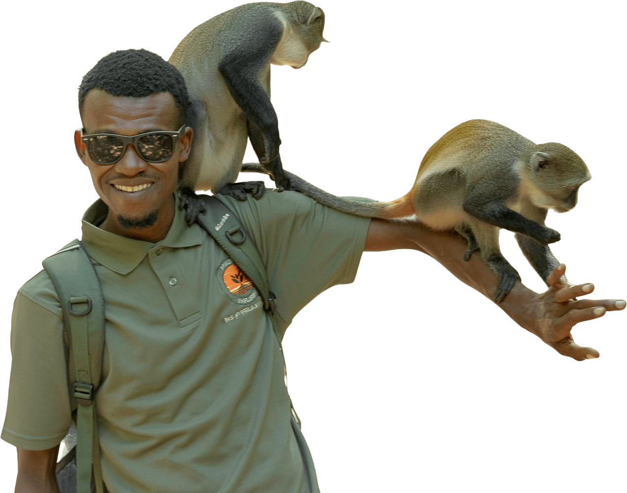 Kevin at Mkoko Explorers playing with monkeys